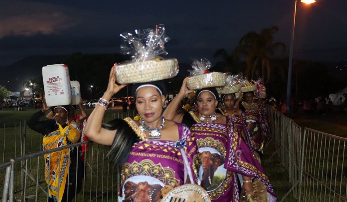 Women Parliamentarians and staff of the Parliamentary Service Heading to Present 'Tetfulo' to Her Majesty The Queen Mother.
