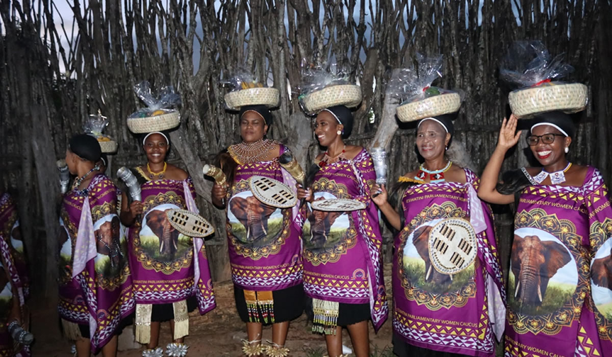Women Parliamentarians and staff of the Parliamentary Service Heading to Present 'Tetfulo' to Her Majesty The Queen Mother.